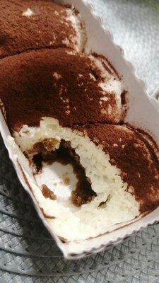 Пирожное Тирамису Dolceria Alba 420г (70г х 6 упак) в инд. упак., Италия (тирамису откусано) Пирожное Тирамису Dolceria Alba 420г (70г х 6 упак) в инд. упак., Италия (фото, тирамису откусано)